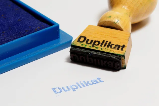 rubber stamp, wooden stamp, duplicate, ink pad, office, paper, duplicate, duplicate, duplicate, duplicate, duplicate. Idempotency and duplicate prevention